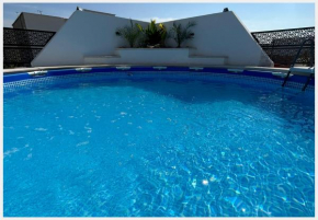 Superbe penthouse avec piscine et barbecue
